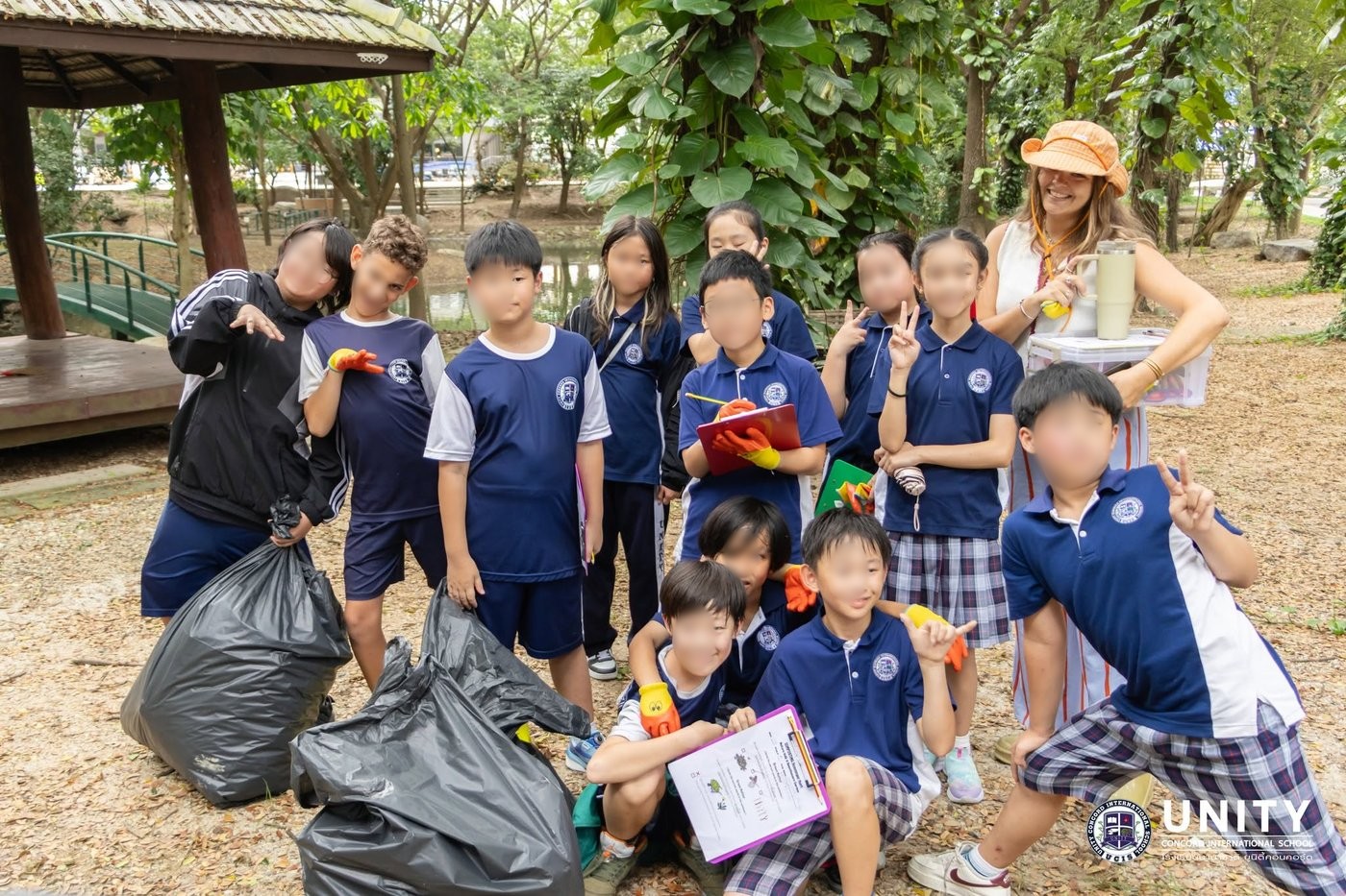 Class group photo after a litter clean-up field trip tied to the composting unit