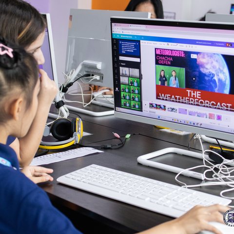 Student editing a weather forecast video project in Canva