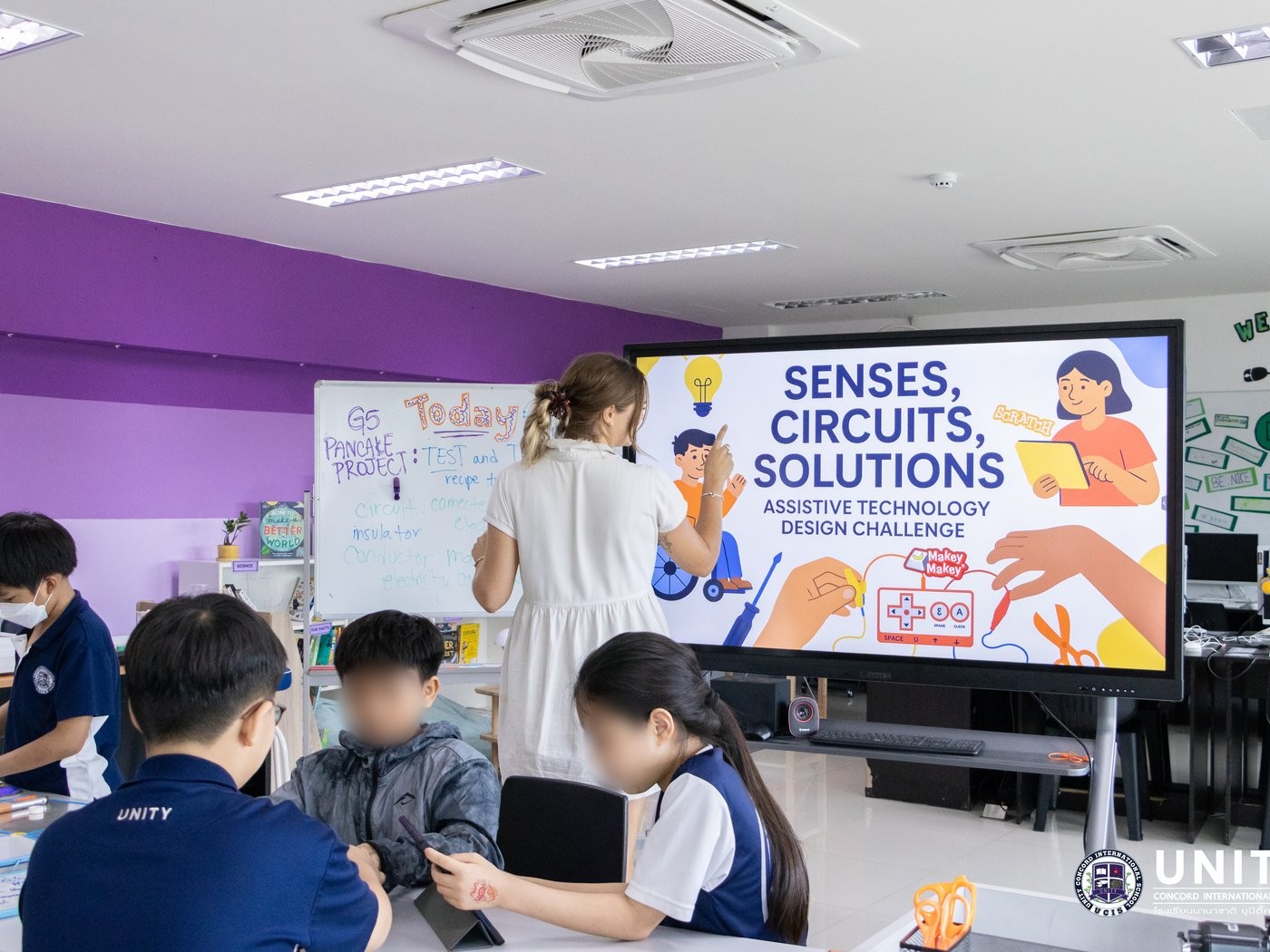Smartboard slide introducing the Senses, Circuits, Solutions assistive-technology design challenge