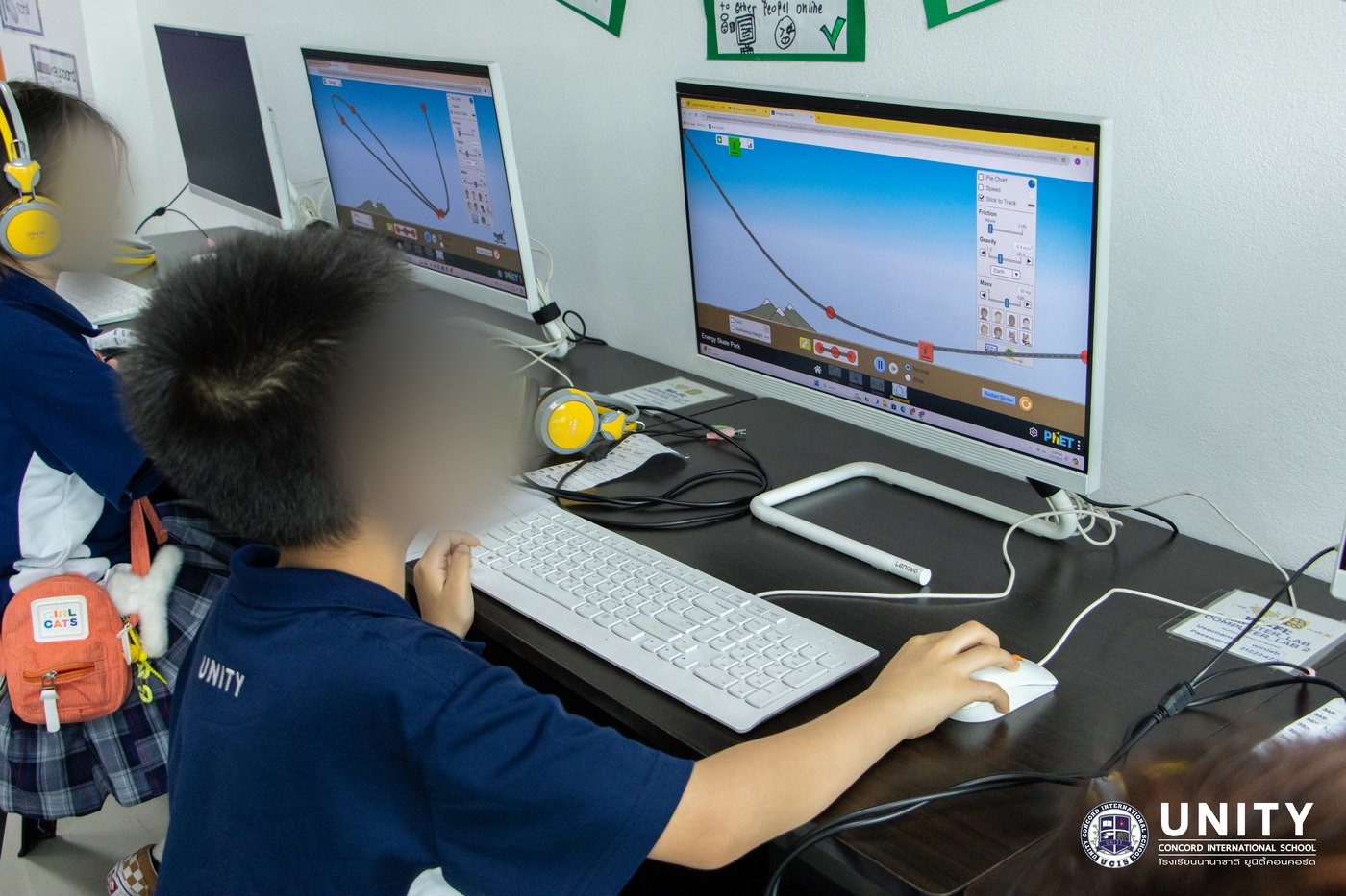 Students running the PhET Energy Skate Park simulation